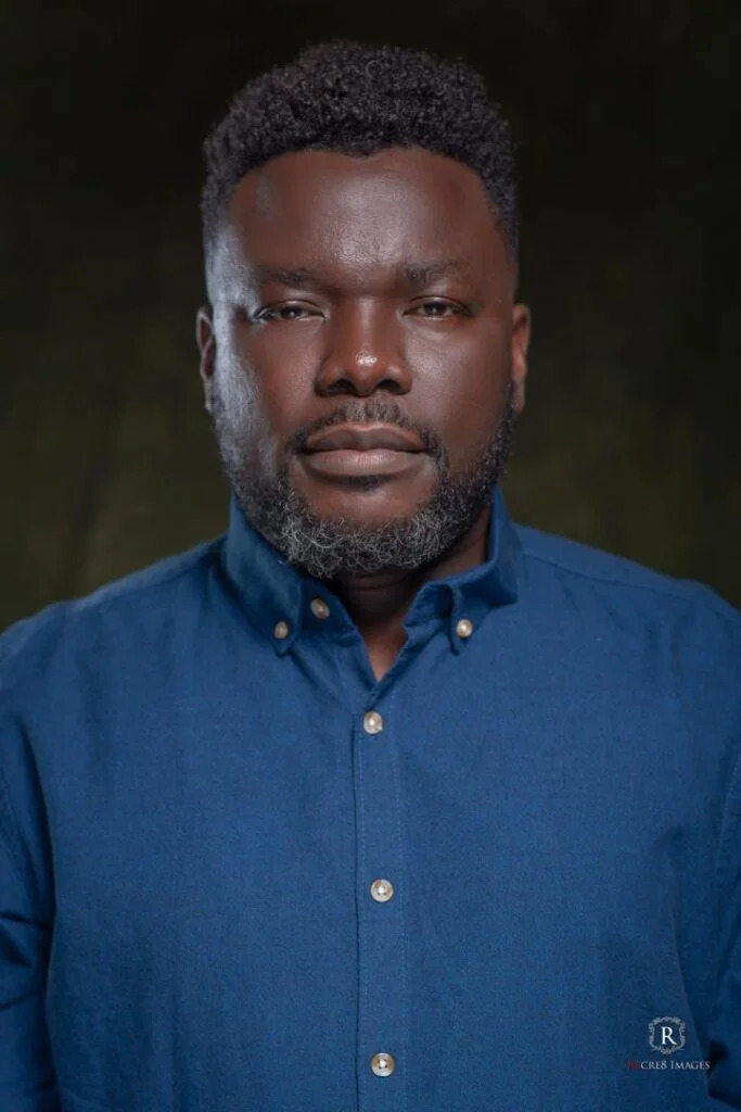 Portrait of Kenneth Uphopho